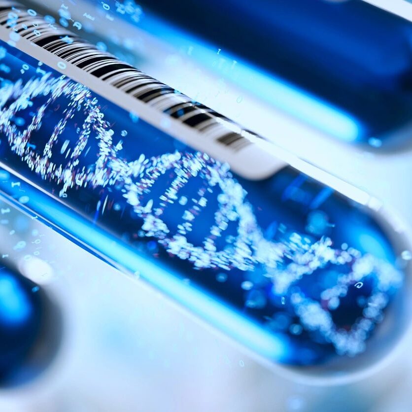 DNA strand inside a laboratory test tube under blue light.